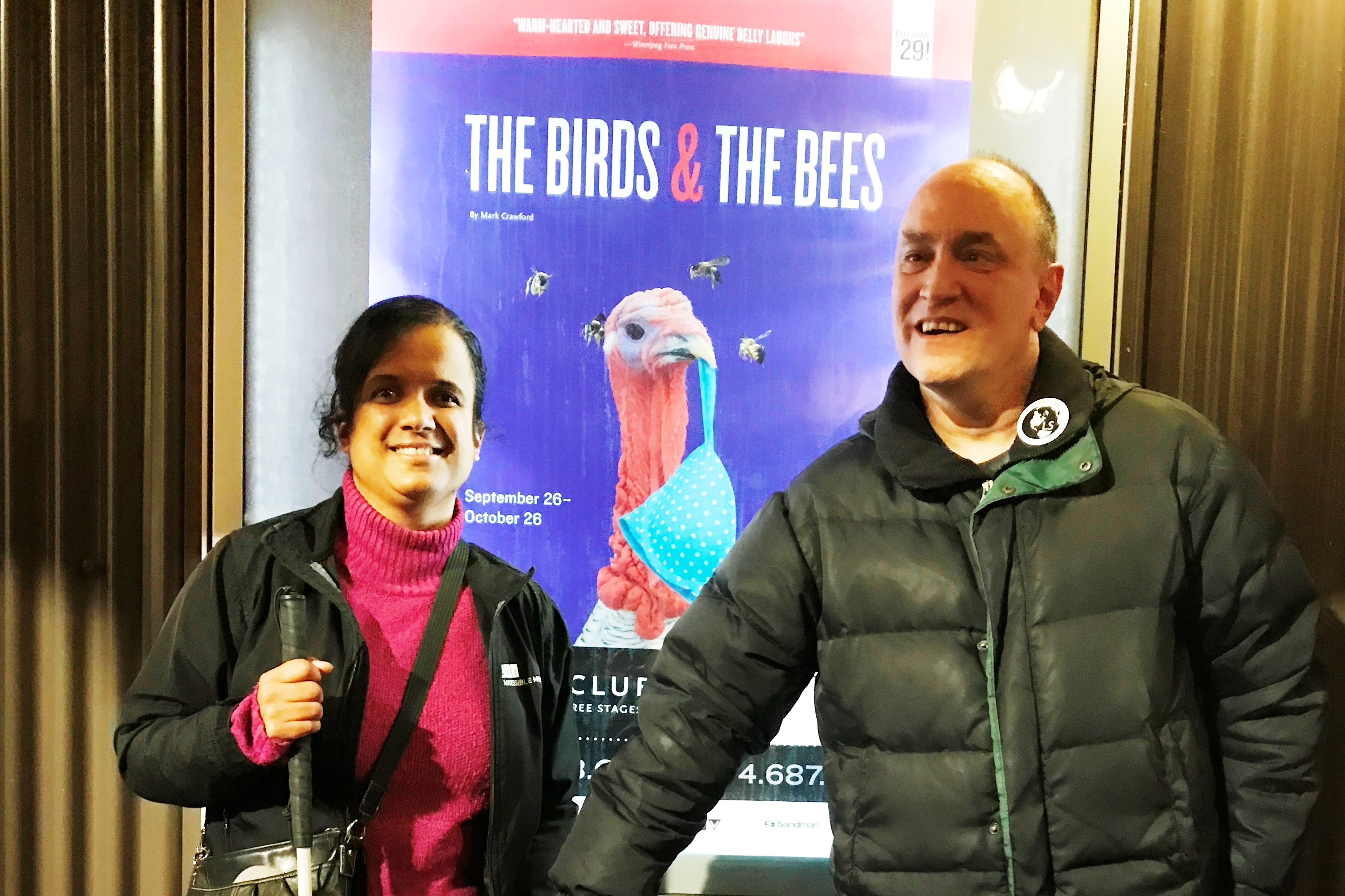 Shawn and Kristy with the play poster featuring a turkey in a blue, polka-dotted bra