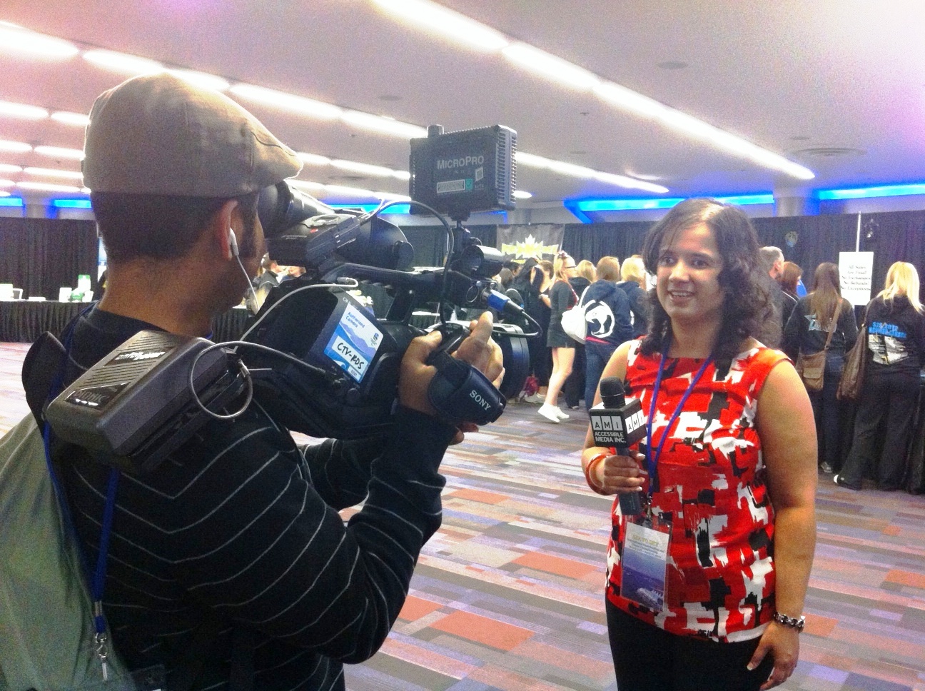 Kristy interviewing cheerleaders